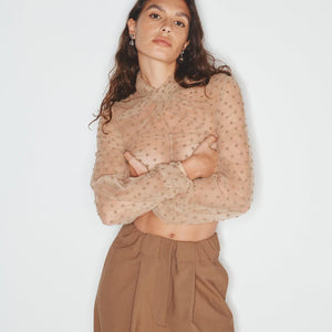 Barely There, Everywhere: Adapting the Sheer Trend for Work, Weekend, and Beyond